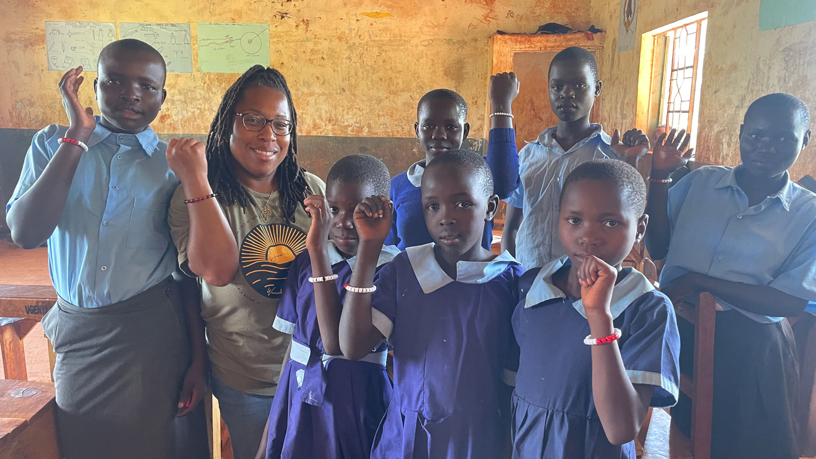 LaDaisy Turner standing with children