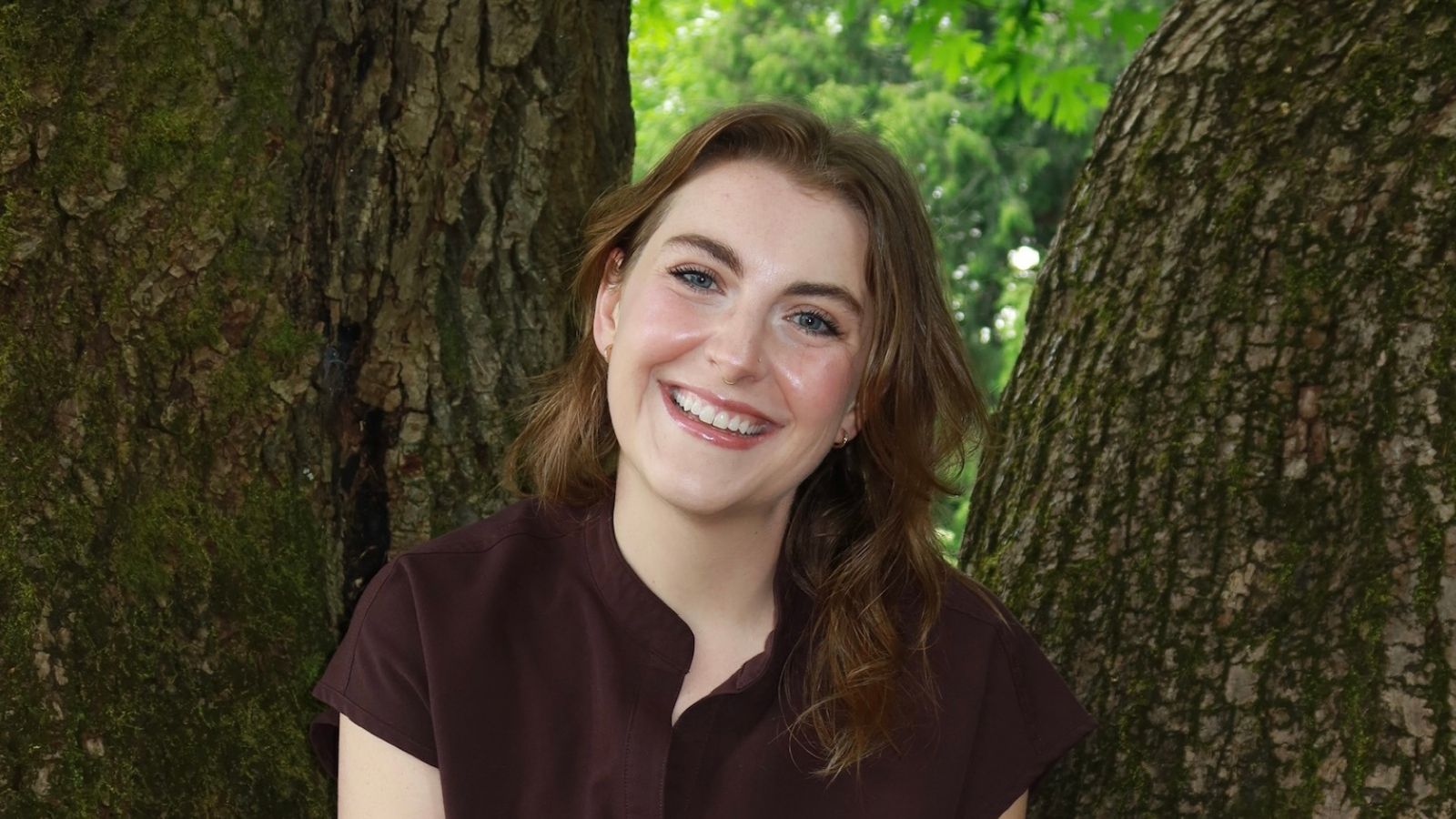 Lara Pate by tree