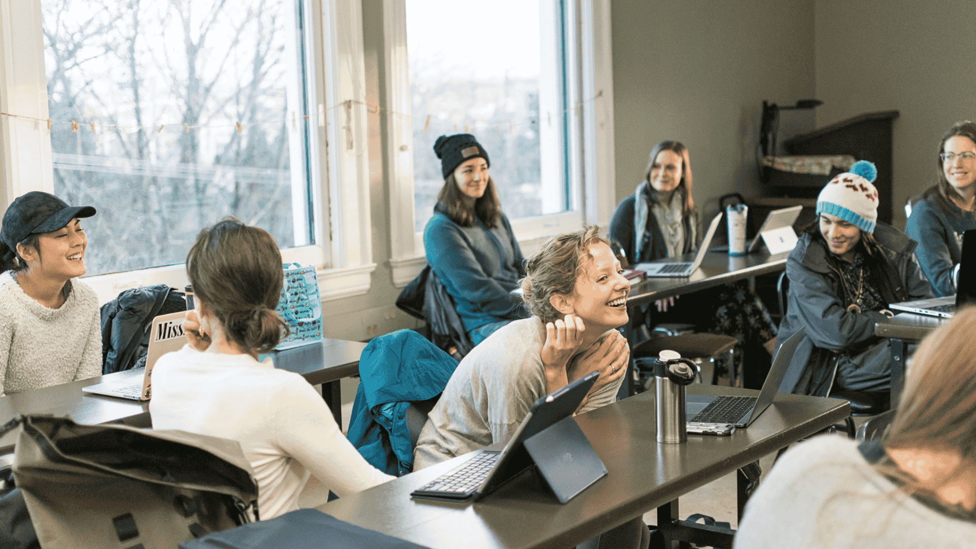 Students smiling in the classroom at NUNM