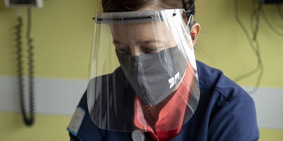 Masks, face coverings or face shields are required in all indoor spaces on the NUNM campus, as shown in this photo of a healthcare worker at NUNM's Lair Hill Health Center, located at 3025 SW Corbett Avenue, Portland, OR 97201