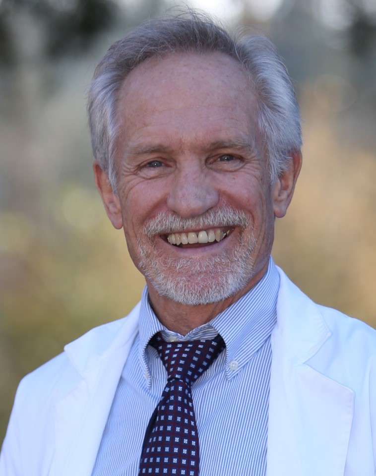 Dr. Peterson in his white coat