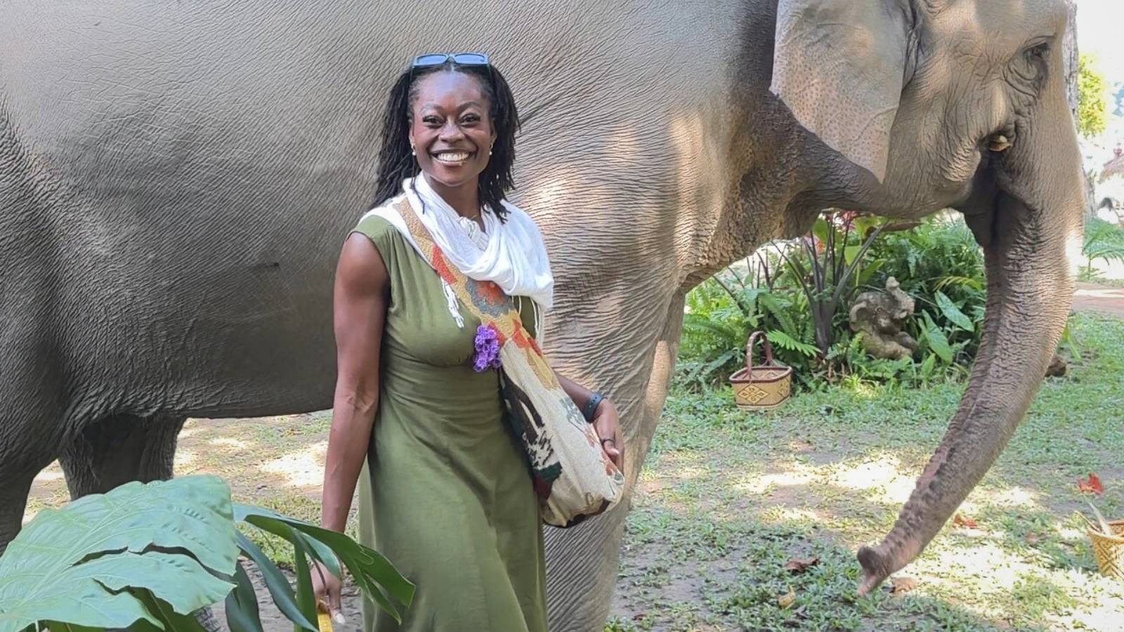 Temilola with elephant in Thailand