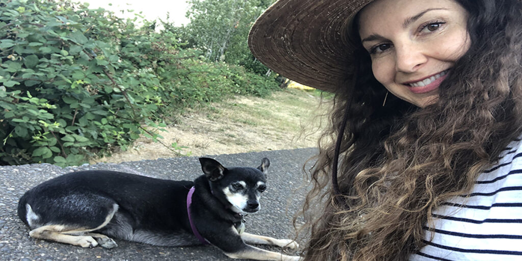 Fifth-year CCM student Monique McKennon and her dog.