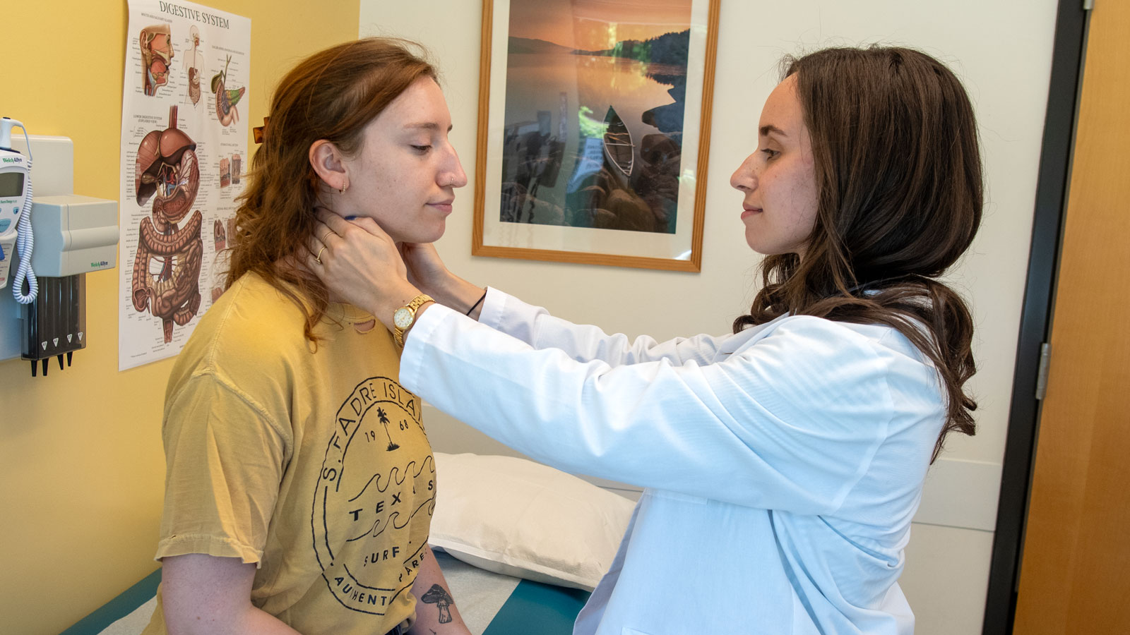 NUNM naturopathic student providing care to a patient in the teaching clinic